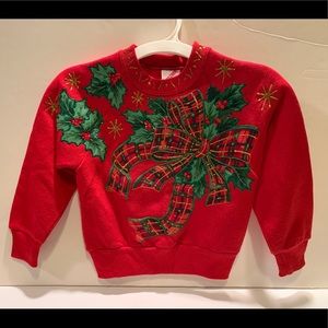 YOUNG CHILD’S CHRISTMAS SWEATSHIRT.